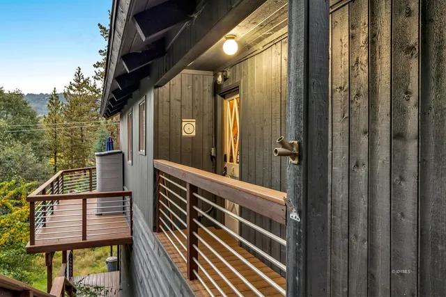 a kitchen with stainless steel appliances granite countertop a refrigerator and a stove