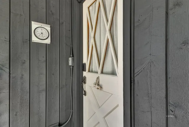 a kitchen with stainless steel appliances granite countertop a refrigerator and a stove