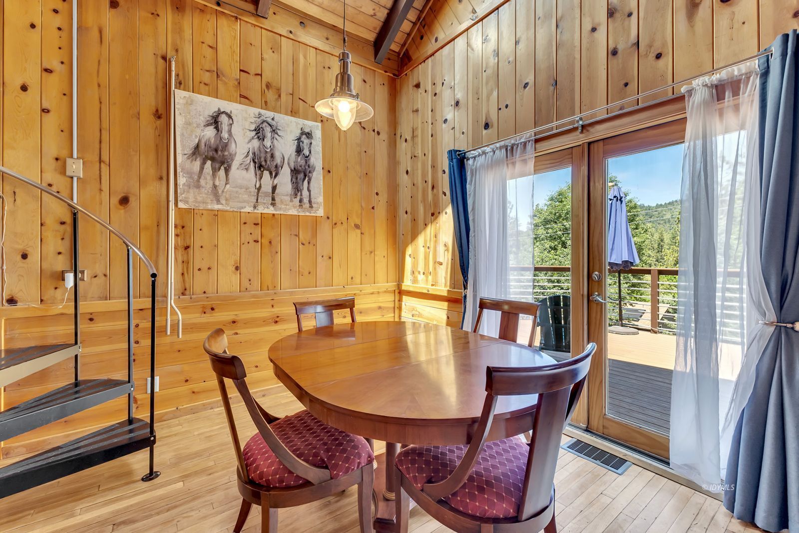 53560 Country Club Drive Idyllwild, CA 92549 - Photo 62 of 66 a dining room with furniture and wooden floor