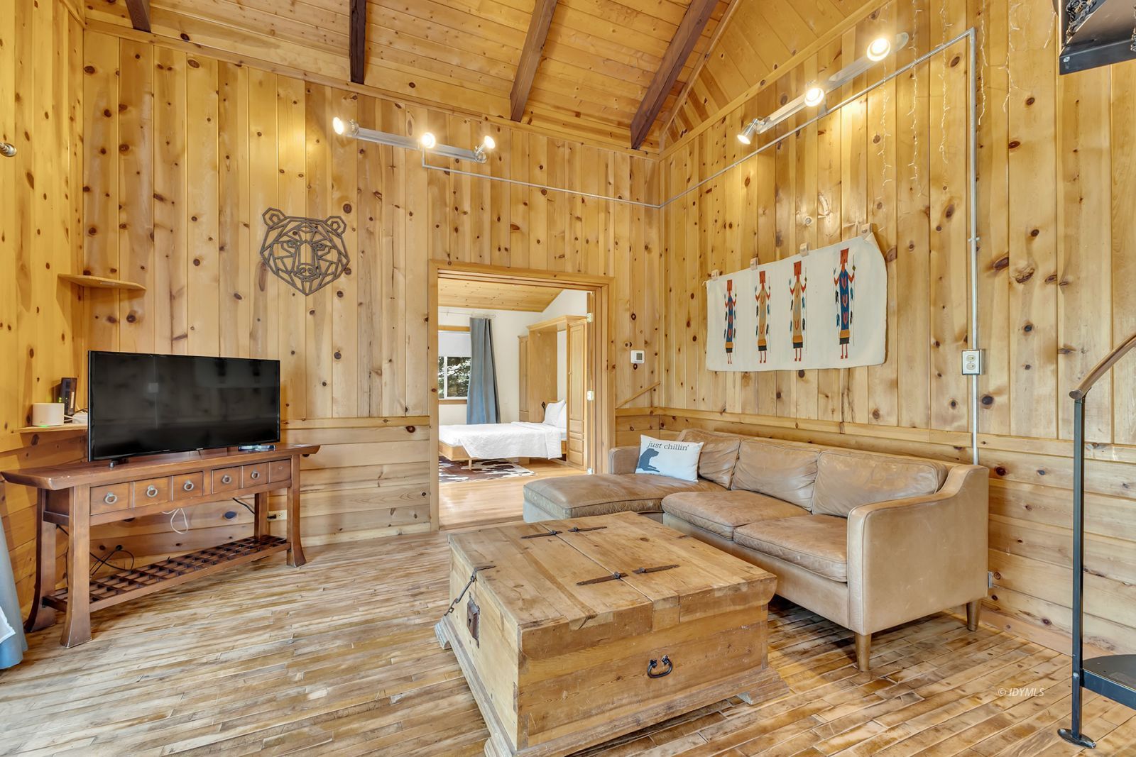 53560 Country Club Drive Idyllwild, CA 92549 - Photo 66 of 66 a living room with fireplace furniture and a flat screen tv