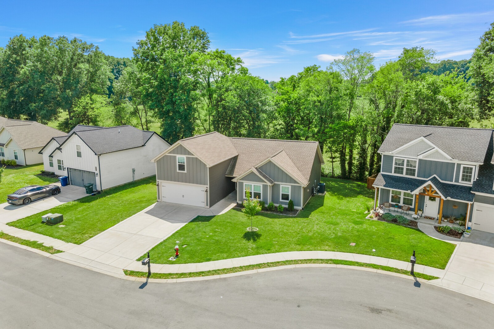 357 Fieldstone Lane Springfield, TN 37172 - Photo 11 of 46 an aerial view of a house with a garden and trees