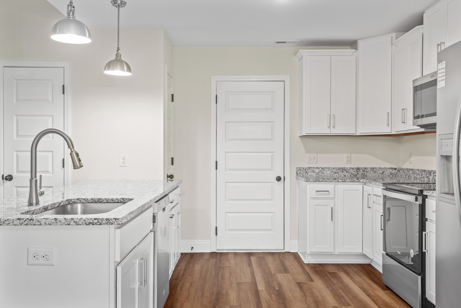357 Fieldstone Lane Springfield, TN 37172 - Photo 17 of 46 a kitchen with granite countertop white cabinets and sink