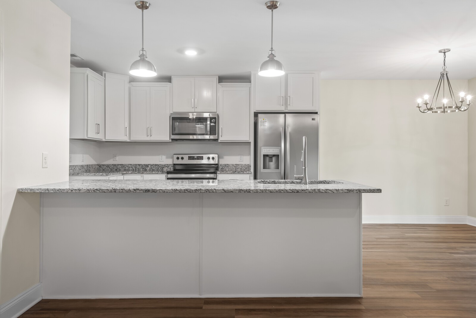 357 Fieldstone Lane Springfield, TN 37172 - Photo 18 of 46 a view of a kitchen with a sink and chandelier