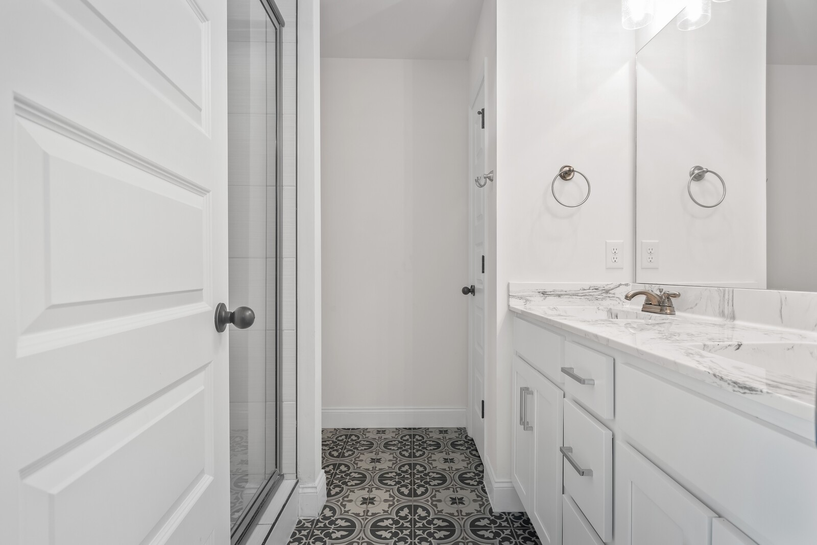 357 Fieldstone Lane Springfield, TN 37172 - Photo 26 of 46 a bathroom with a double vanity sink and mirror with shower