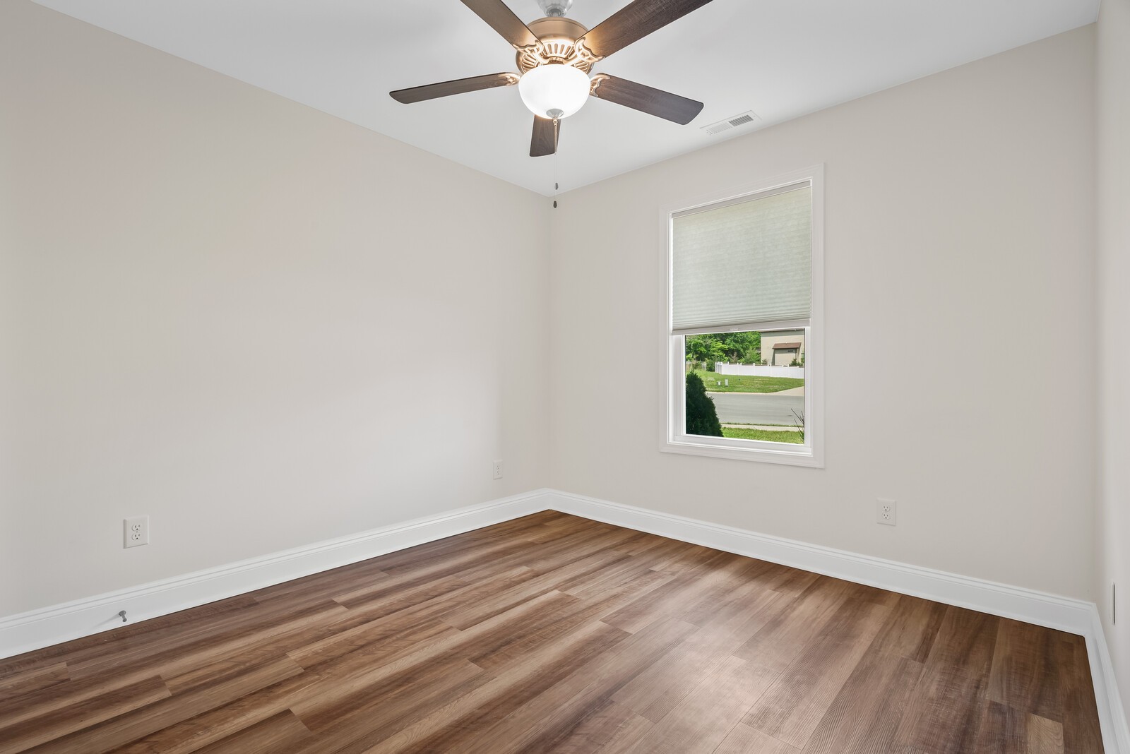 357 Fieldstone Lane Springfield, TN 37172 - Photo 29 of 46 an empty room with a window and a ceiling fan