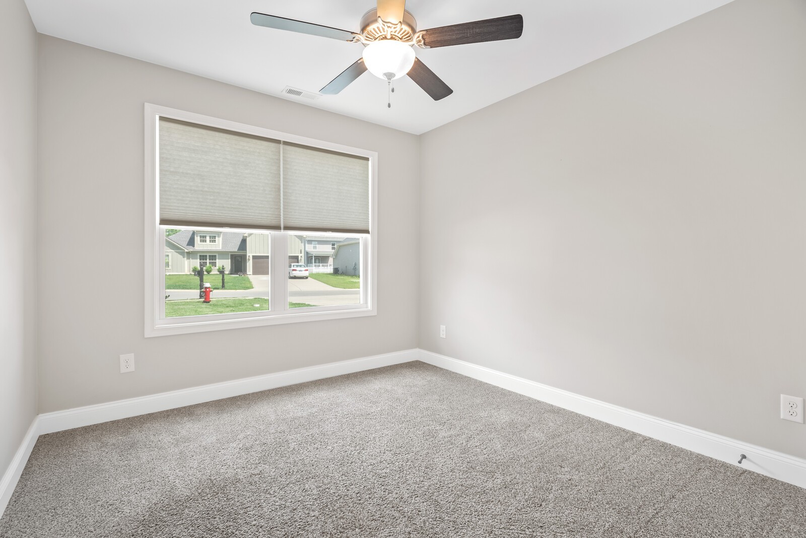 357 Fieldstone Lane Springfield, TN 37172 - Photo 31 of 46 an empty room with a window and a ceiling fan