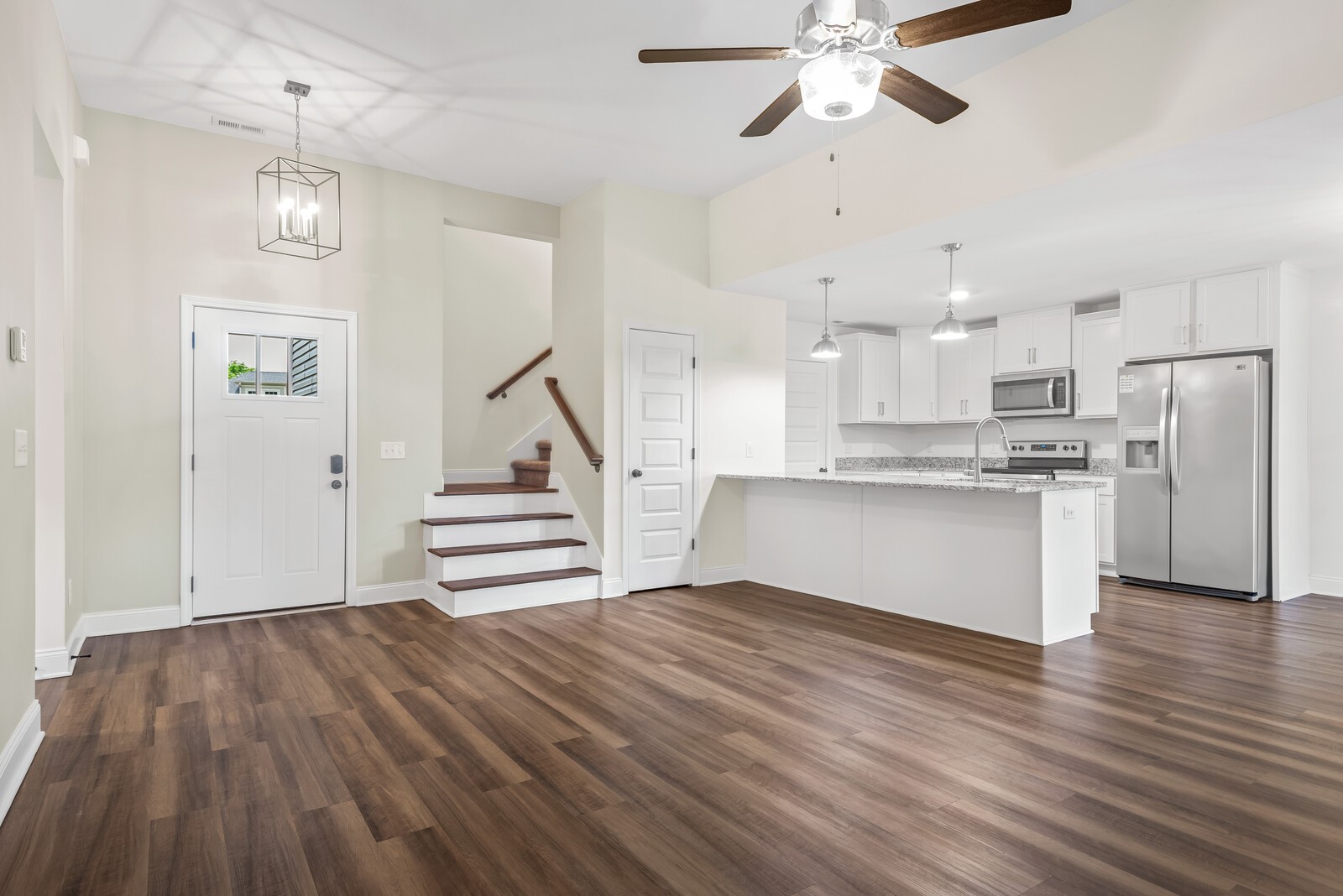 357 Fieldstone Lane Springfield, TN 37172 - Photo 5 of 46 a view of kitchen with wooden floor electronic appliances and window