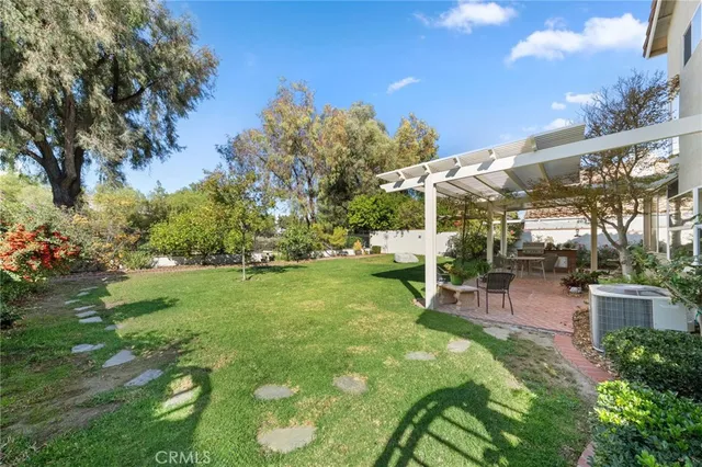 a view of a backyard with a patio
