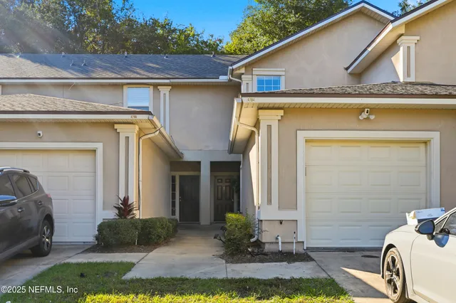 a view of a back yard of the house