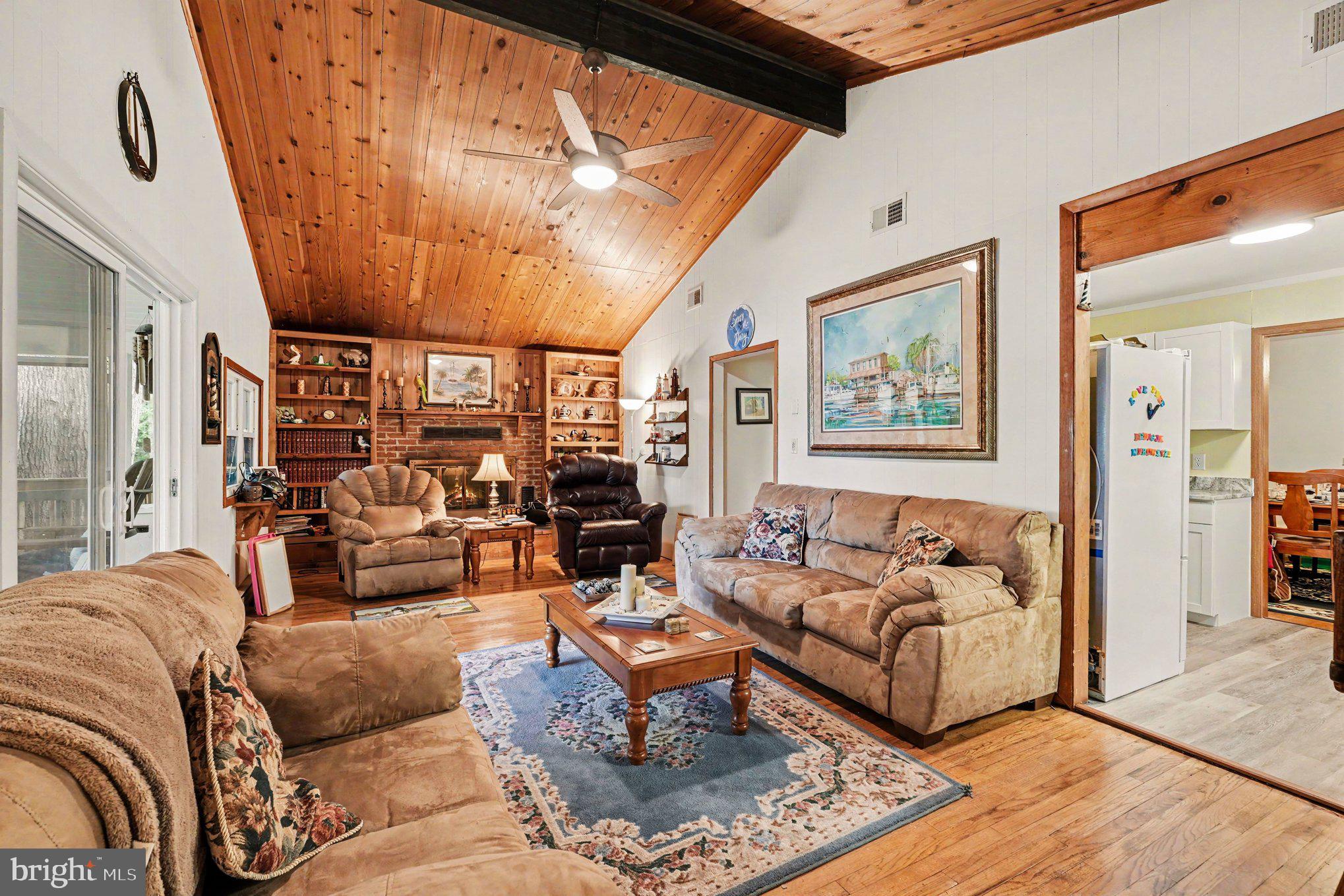 306 Liberty Road Reedville, VA 22539 - Photo 8 of 46 vaulted ceiling and wood burning fireplace