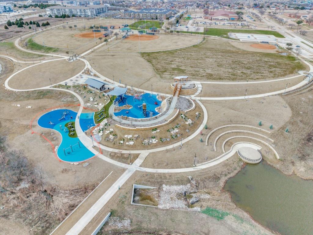 3305 Scotsman Road Sachse, TX 75048 - Photo 34 of 37 Heritage Park is a 36 acre park with 3 lighted baseball fields, playground, walking & biking trails, picnic tables, splash park, pavilion and water features. Sewell Elementary & Hudson Middle School & Sachse HS all within 1.5 miles.