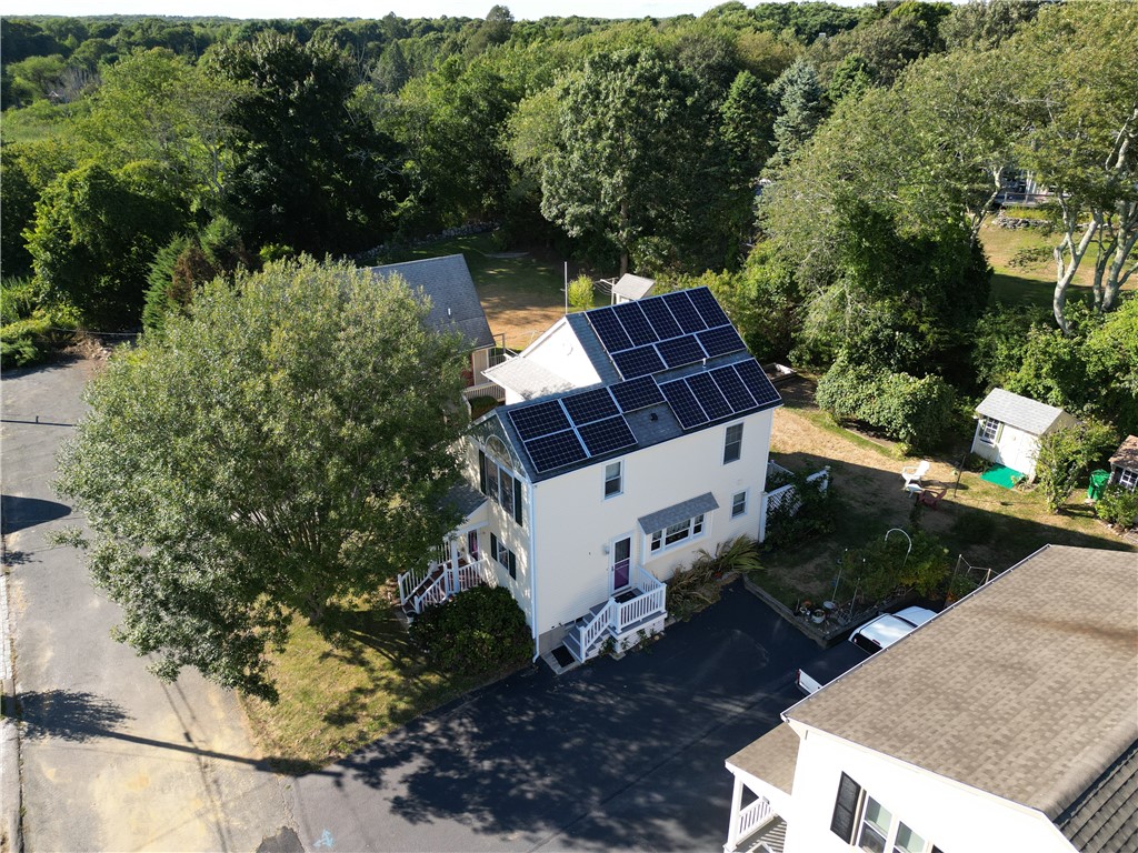 17 West Side Road South Kingstown, RI 02879 - Photo 2 of 49 Side of the house showing the solar panels