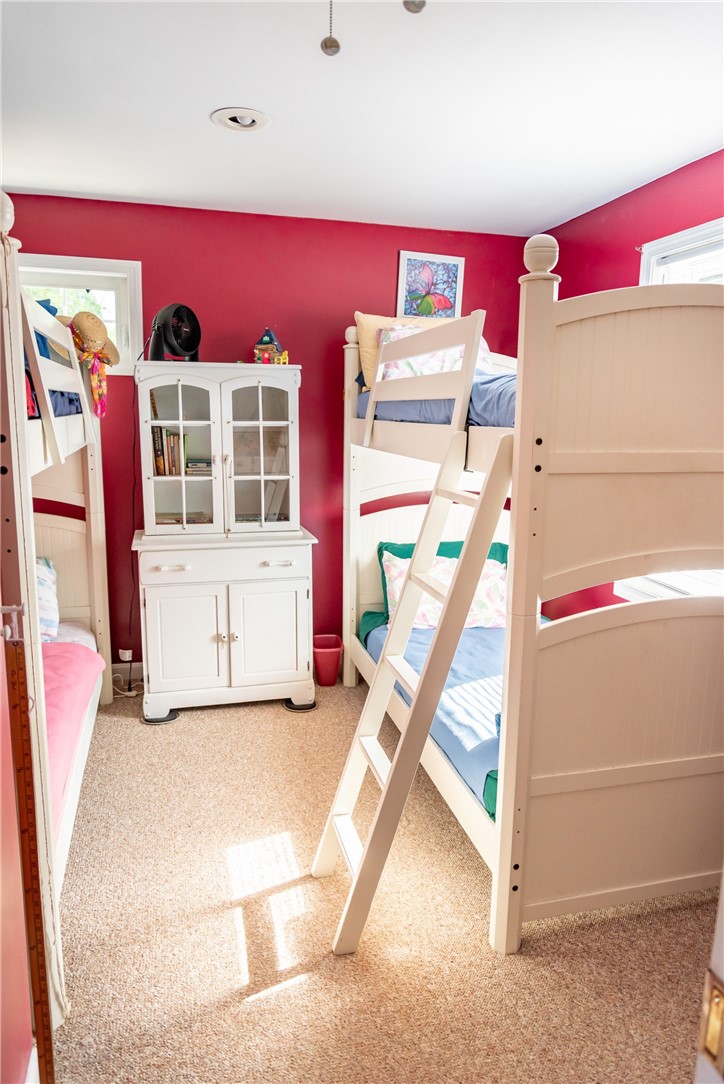 17 West Side Road South Kingstown, RI 02879 - Photo 37 of 49 This bedroom is used as a bunk room holding 4 twin beds and a bureau