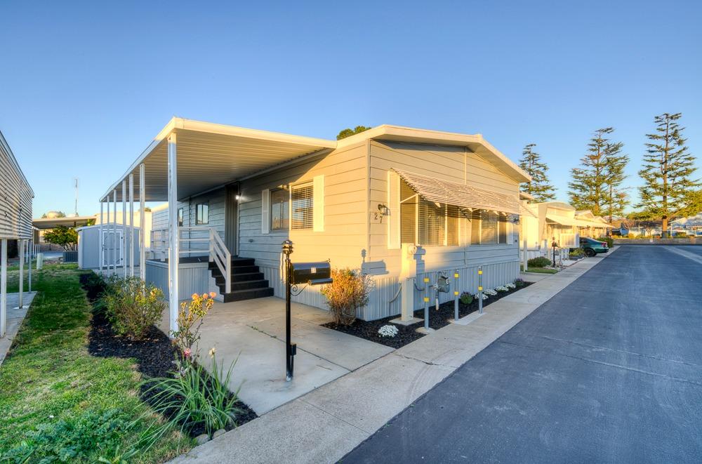 a front view of a house with patio