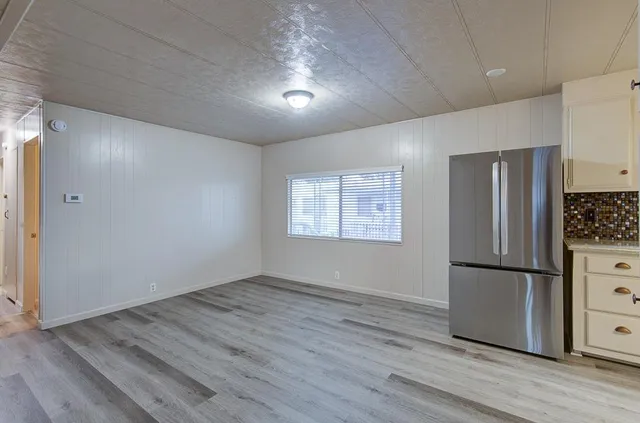 a bathroom with a sink toilet and mirror