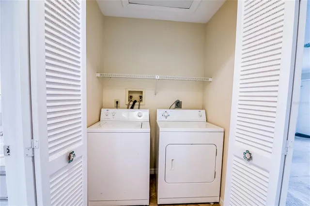 a utility room with dryer and washer