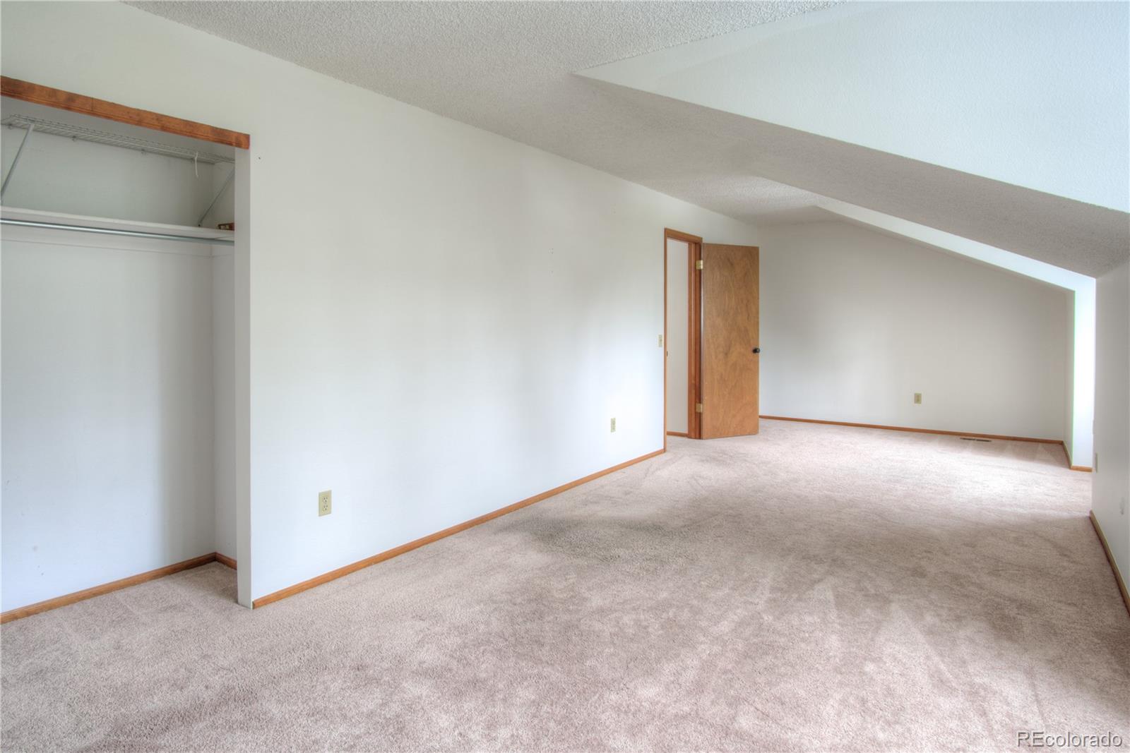 10385 East Red Mountain Road Littleton, CO 80127 - Photo 26 of 47 a view of an empty room