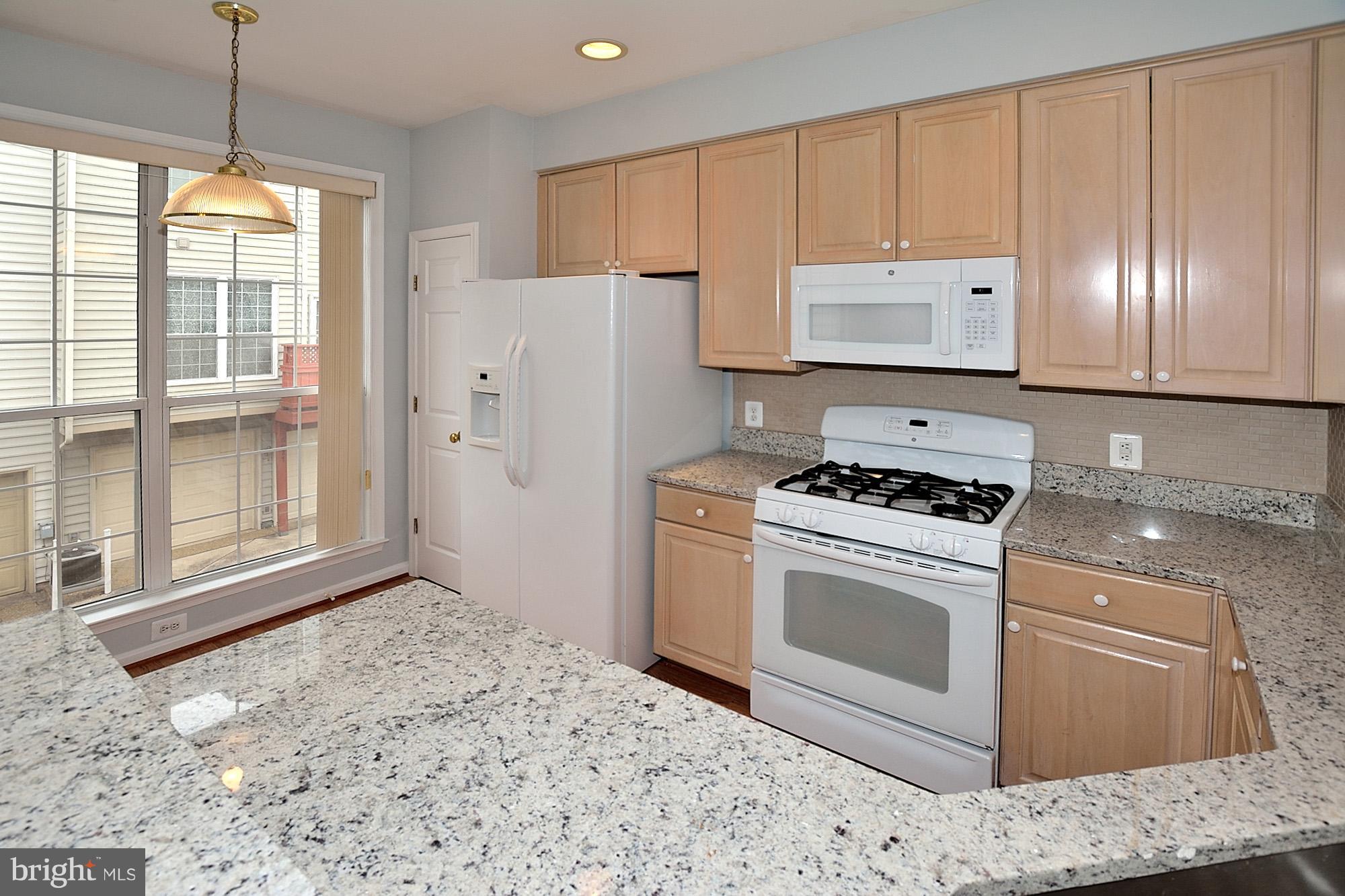 6022 Lincolnia Road Alexandria, VA 22312 - Photo 8 of 19 Kitchen with Maple Cabinet