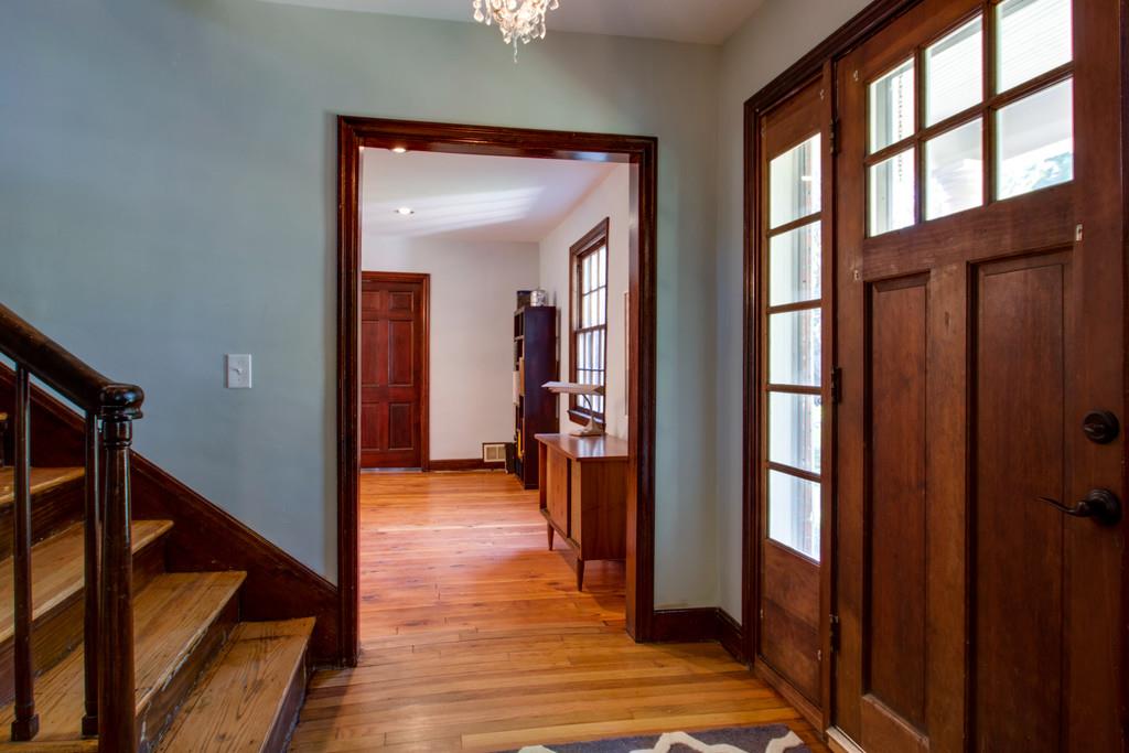 1109 Neelys Bend Road Madison, TN 37115 - Photo 2 of 30 a view of a hallway view with wooden floor and staircase