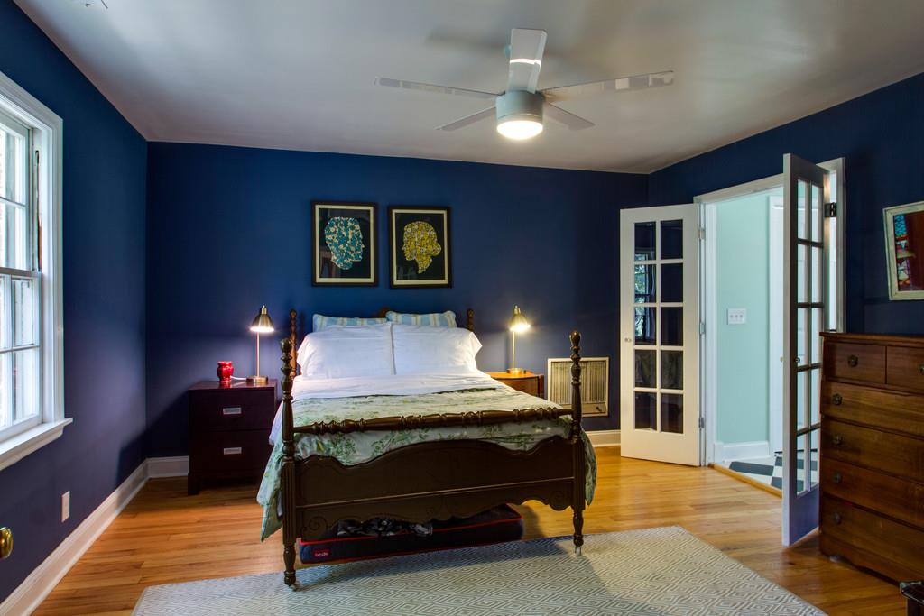 1109 Neelys Bend Road Madison, TN 37115 - Photo 16 of 30 a bedroom with a bed and a lamp on dresser