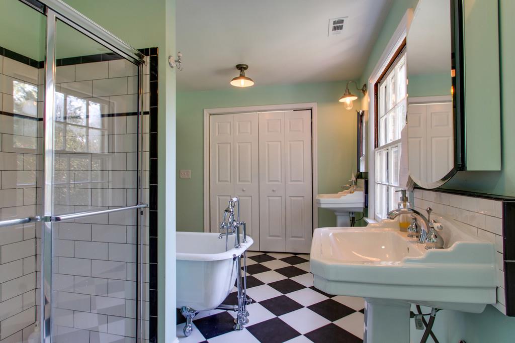 1109 Neelys Bend Road Madison, TN 37115 - Photo 18 of 30 a bathroom with a sink toilet and shower