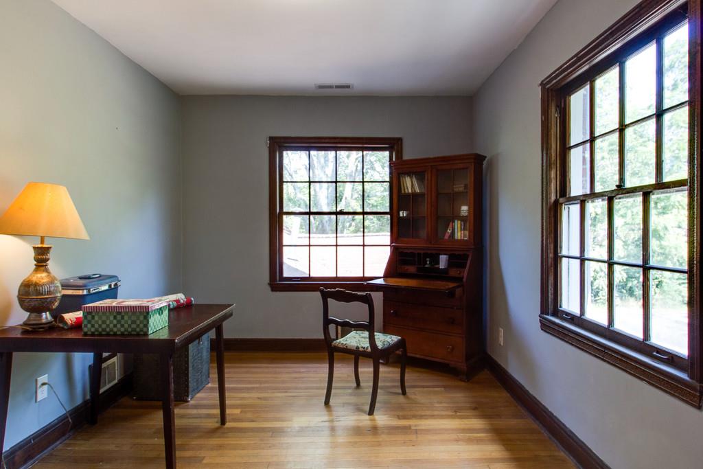 1109 Neelys Bend Road Madison, TN 37115 - Photo 21 of 30 a view of a workspace with furniture and a window