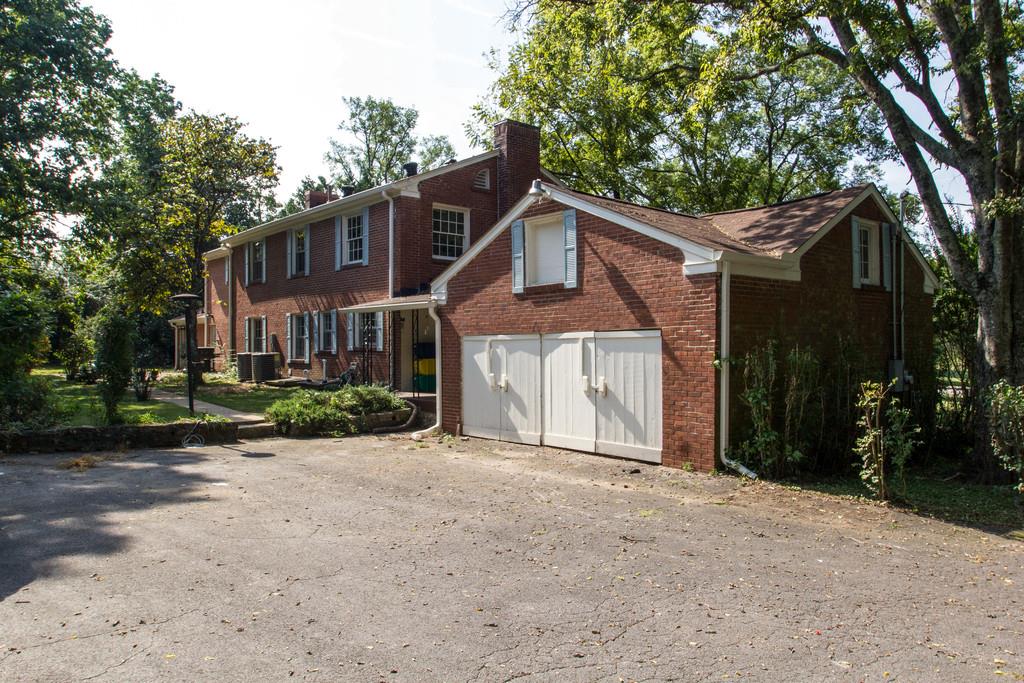 1109 Neelys Bend Road Madison, TN 37115 - Photo 28 of 30 a front view of a house with a yard