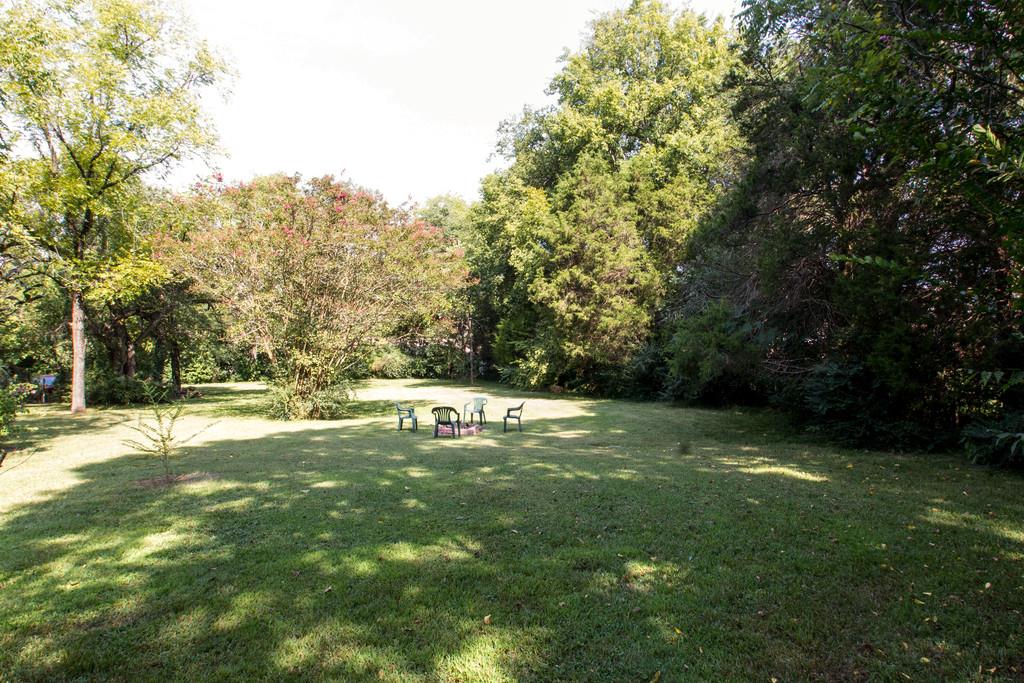 1109 Neelys Bend Road Madison, TN 37115 - Photo 29 of 30 a view of a backyard with a trees