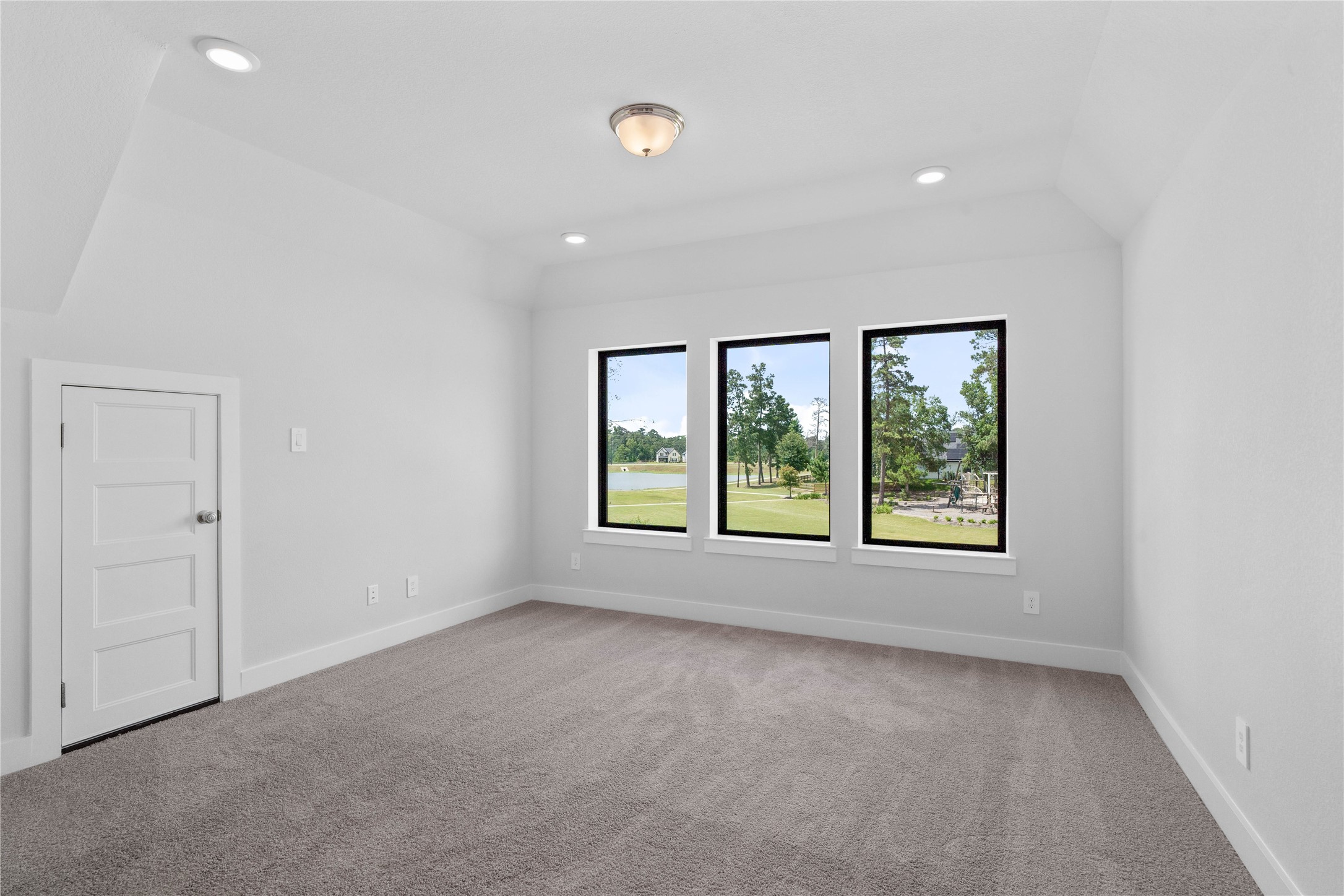 551 Black Bronco Road Magnolia, TX 77354 - Photo 35 of 50 This versatile second-floor Game Room is spacious and bright providing abundant natural light. It offers endless possibilities—envision a cozy media room, a vibrant play area, or a quiet reading nook—adapting easily to the buyer's needs.