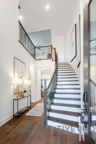 a view of entryway livingroom and hall