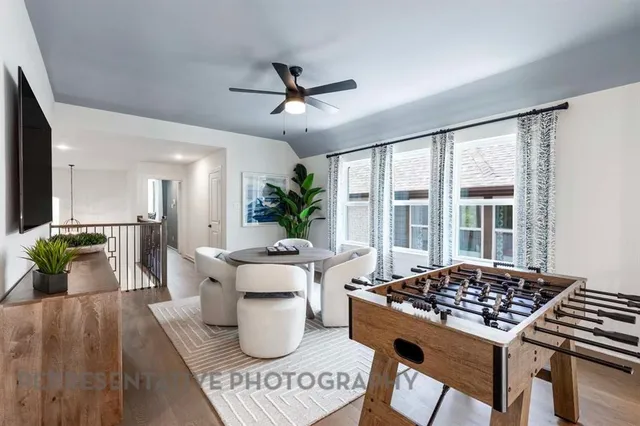 a living room with furniture and a table