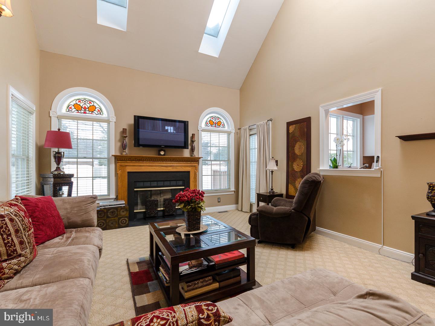 14 Brookwood Road Mount Laurel, NJ 08054 - Photo 17 of 45 The family room has neutral paint and carpet