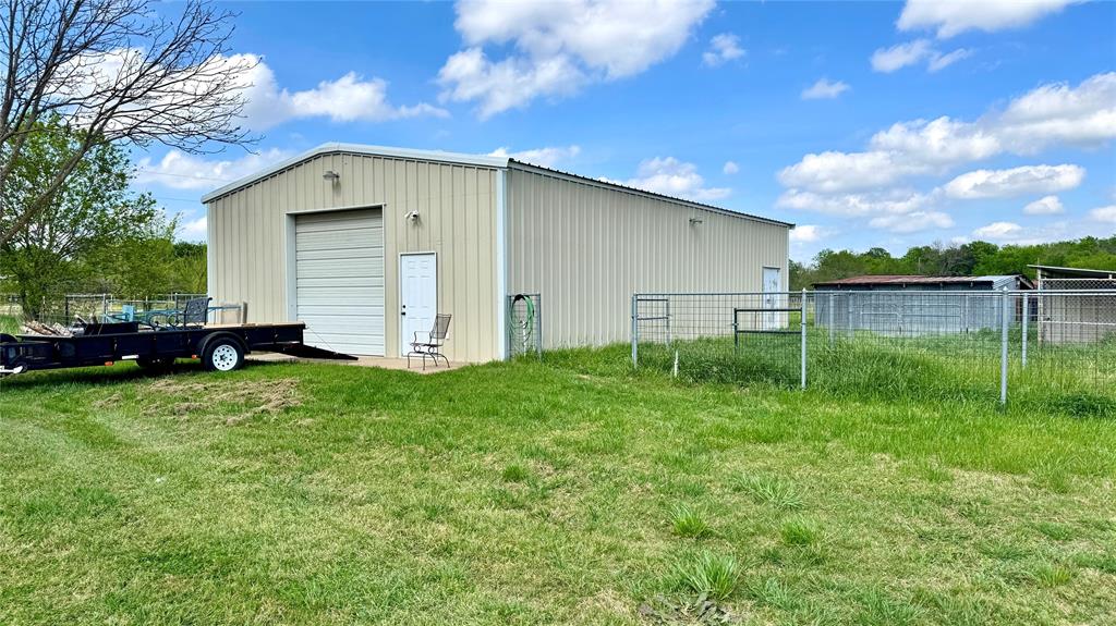 2050 Griffith Avenue Terrell, TX 75160 - Photo 23 of 27 a view of a backyard with a garden
