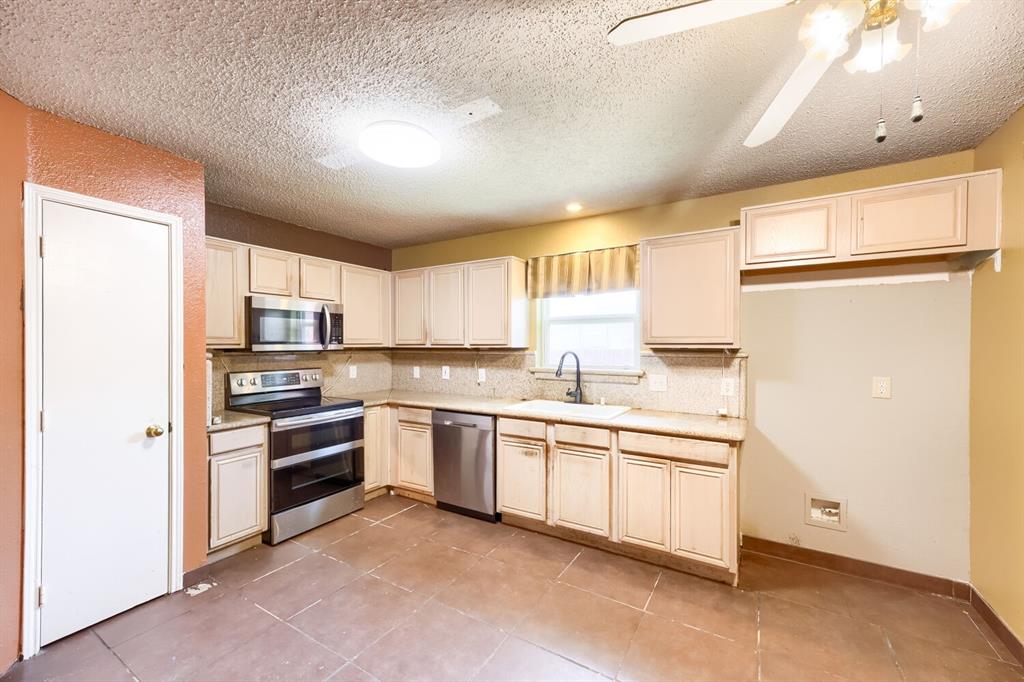 9324 Teagarden Road Dallas, TX 75217 - Photo 11 of 28 Gallery Image 11