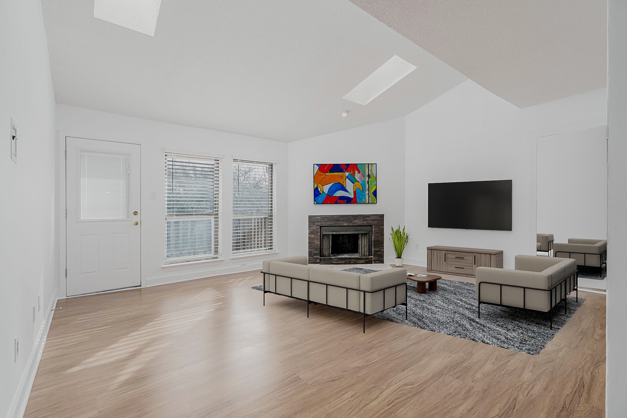 2277 South Kirkwood Road, Unit 4/808 Houston, TX 77077 - Photo 4 of 23 Experience the perfect blend of modern elegance and cozy charm in this virtually staged living room, featuring abundant natural light, a stylish fireplace, and sleek furnishings that inspire relaxation and sophistication.