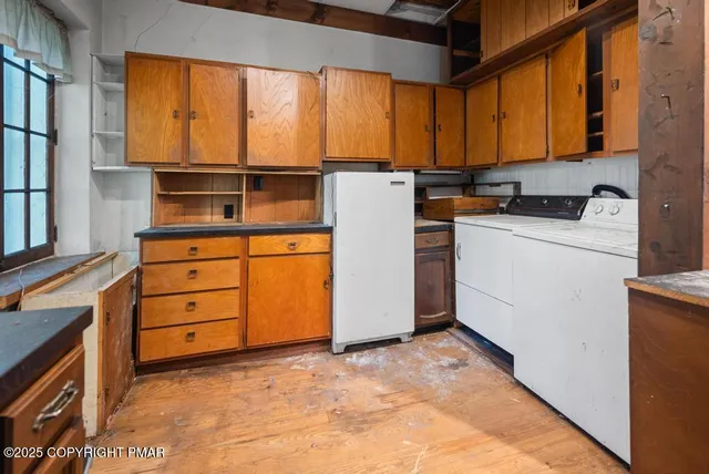 a view of outdoor space with wooden floor and seating space