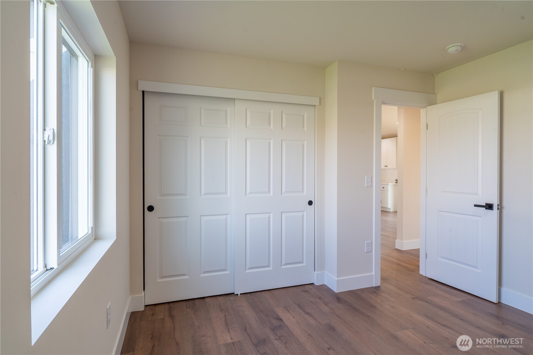 70 Sunwest Drive Ephrata, WA 98823 - Photo 22 of 34 a view of empty room with wooden floor
