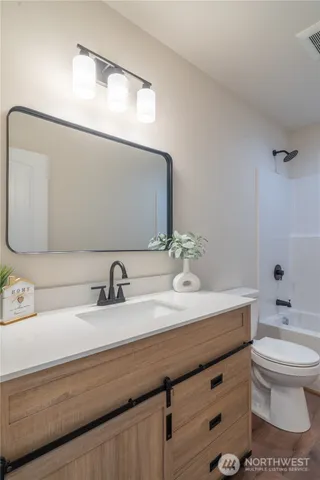 a bathroom with a sink and a toilet