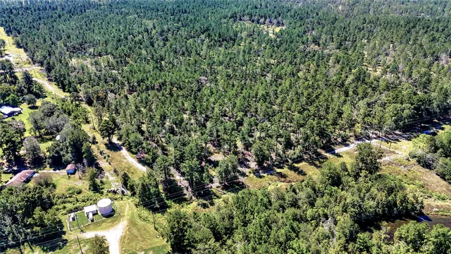 a view of a field with an outdoor space