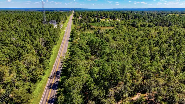 a view of a field with an outdoor space