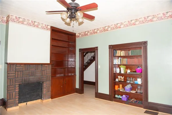 a view of a livingroom with a bookshelf