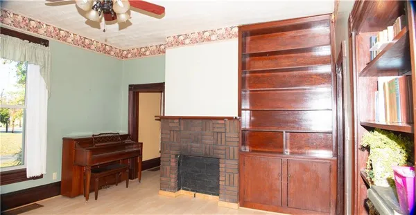 a room with closet and a window