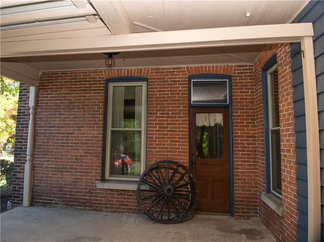 a front view of a house with a door