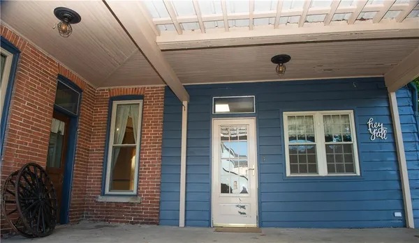 a front view of a house with a garage