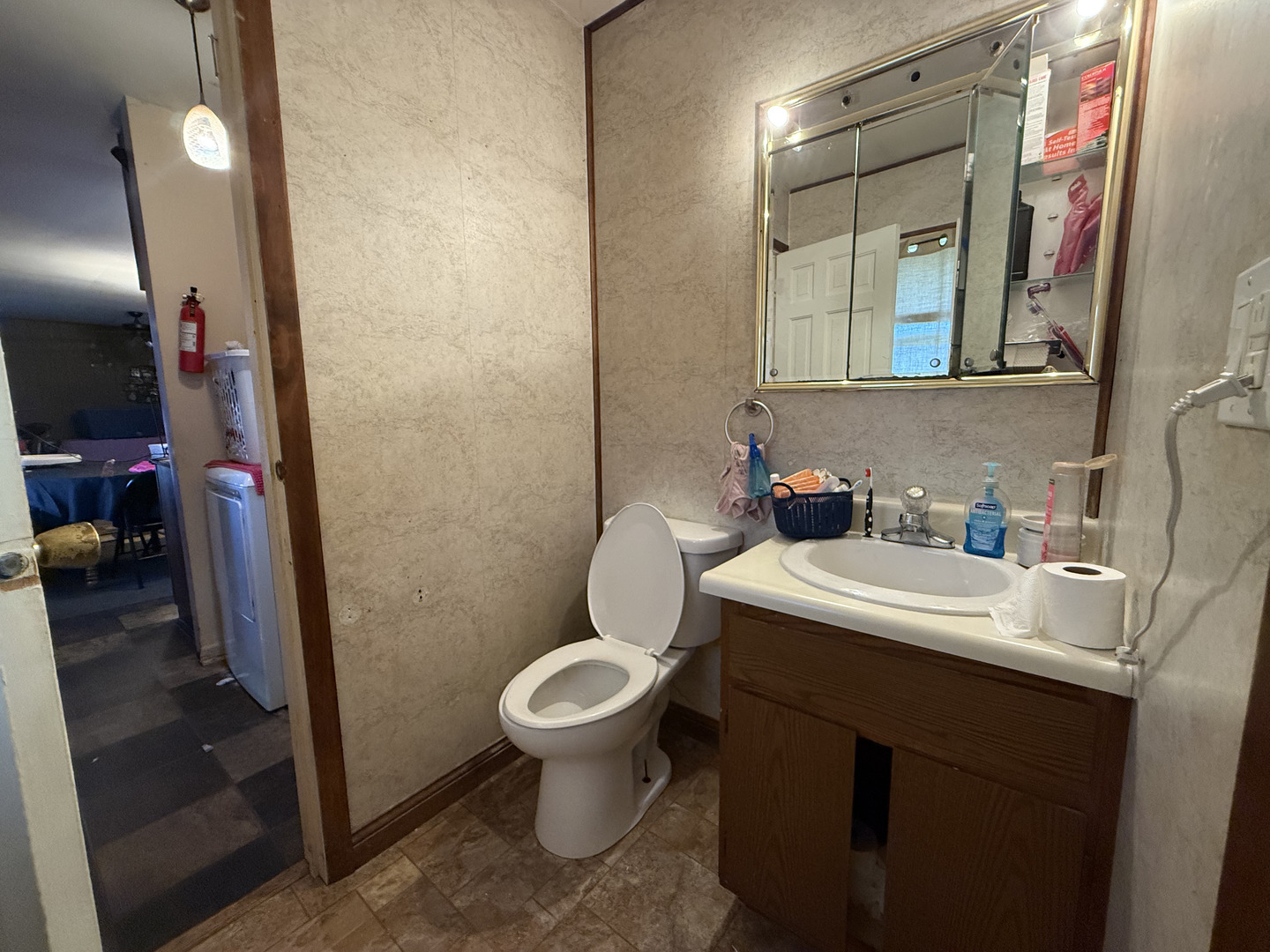 1021 Briarcliff Drive Rantoul, IL 61866 - Photo 12 of 33 a bathroom with a sink toilet and shower