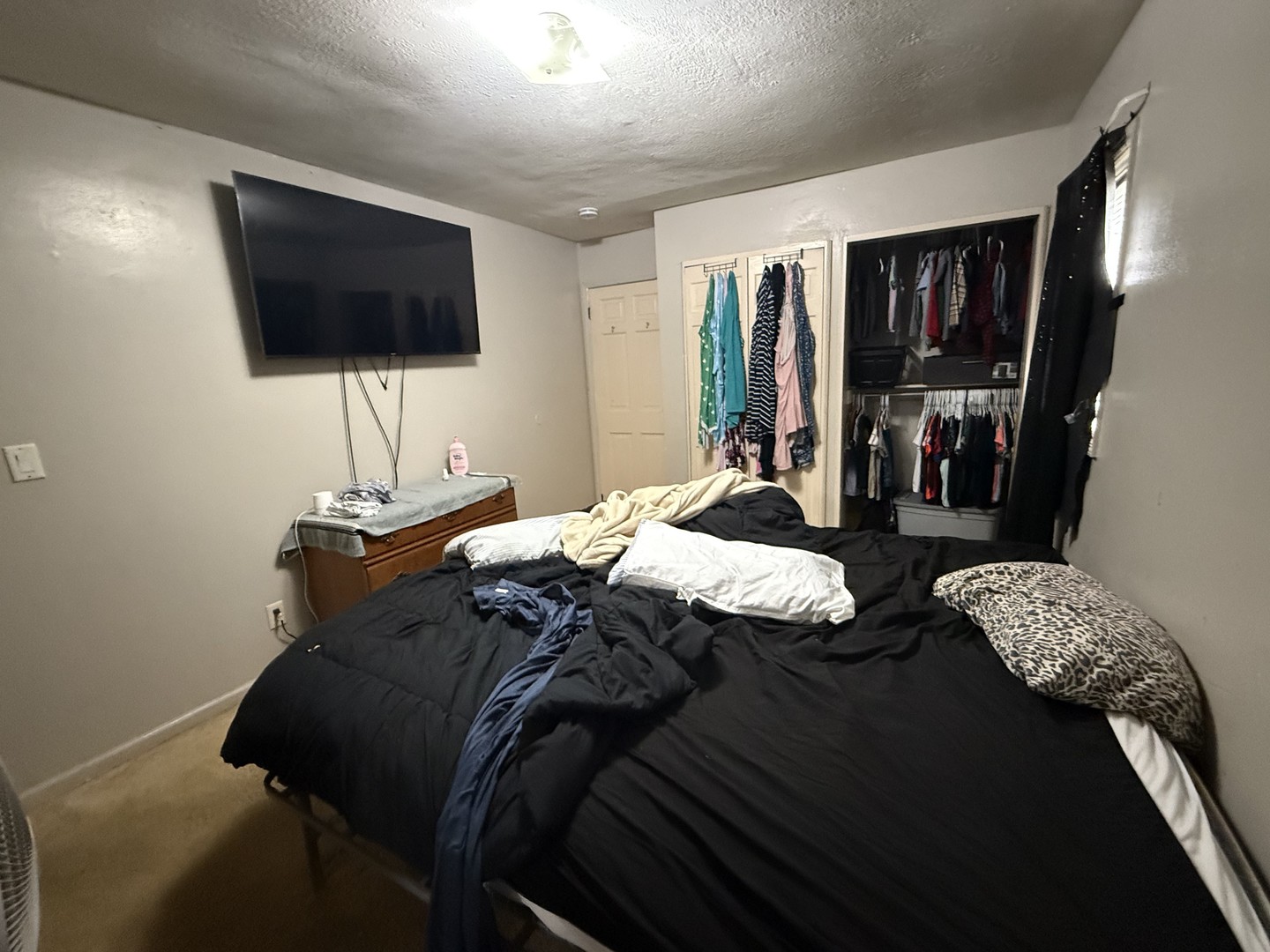 1021 Briarcliff Drive Rantoul, IL 61866 - Photo 15 of 33 a bedroom with a bed tv and a window