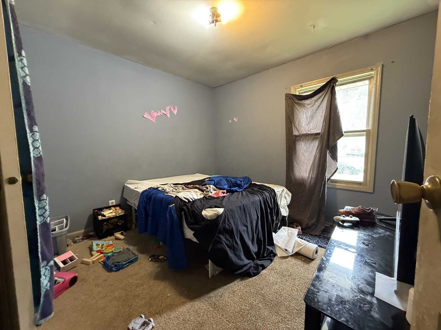 1021 Briarcliff Drive Rantoul, IL 61866 - Photo 18 of 33 a bedroom with a bed and wooden floor