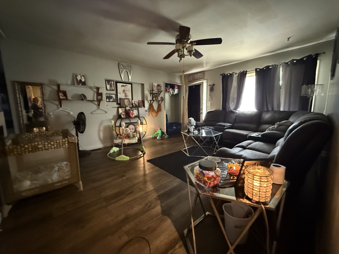 1021 Briarcliff Drive Rantoul, IL 61866 - Photo 4 of 33 a living room with furniture and wooden floor