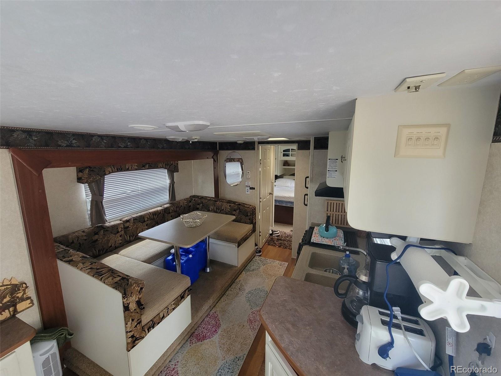 94 Pullman Loop Fairplay, CO 80440 - Photo 13 of 21 a living room with furniture and wooden floor