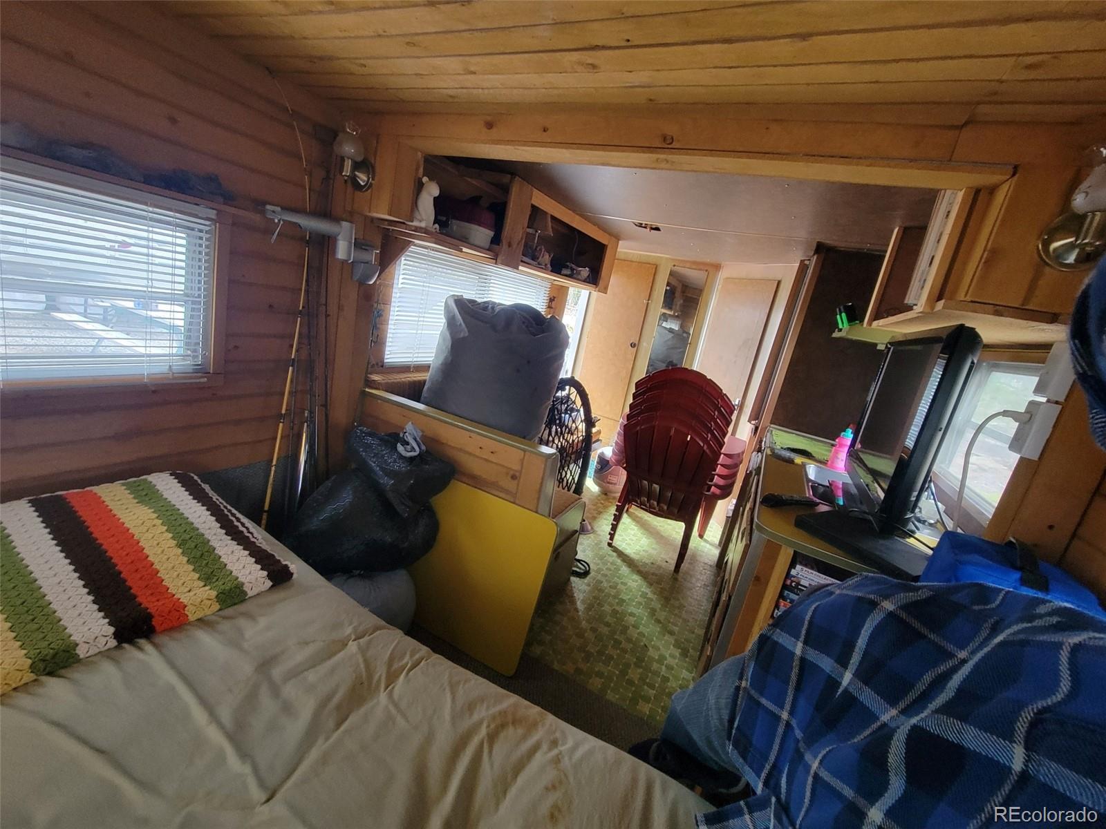 94 Pullman Loop Fairplay, CO 80440 - Photo 17 of 21 a living room with furniture and a mirror
